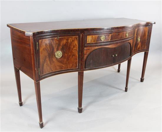 A George III crossbanded mahogany serpentine sideboard, W.6ft 1in. D.2ft 2in. H.3ft